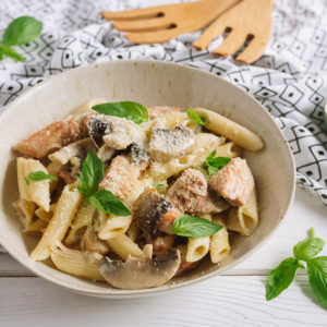 Пенне с курицей, индейкой и шампиньонами | Penne with slices of chicken and turkey and mushrooms in a creamy sauce, grated cheese and fresh basil leaves.